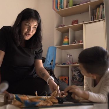 Therapist working with an autistic child